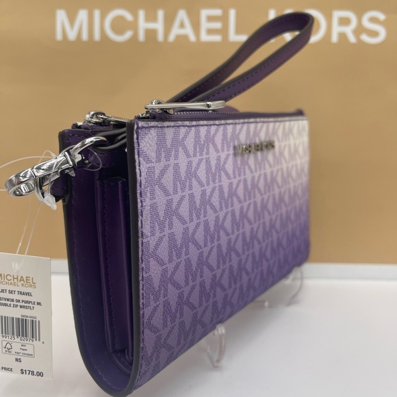 Michael Kors Handbags - MICHAEL KORS Jet Set Lg Ombré Sign Logo Double Zip Wristlet Phone
Dark Purple